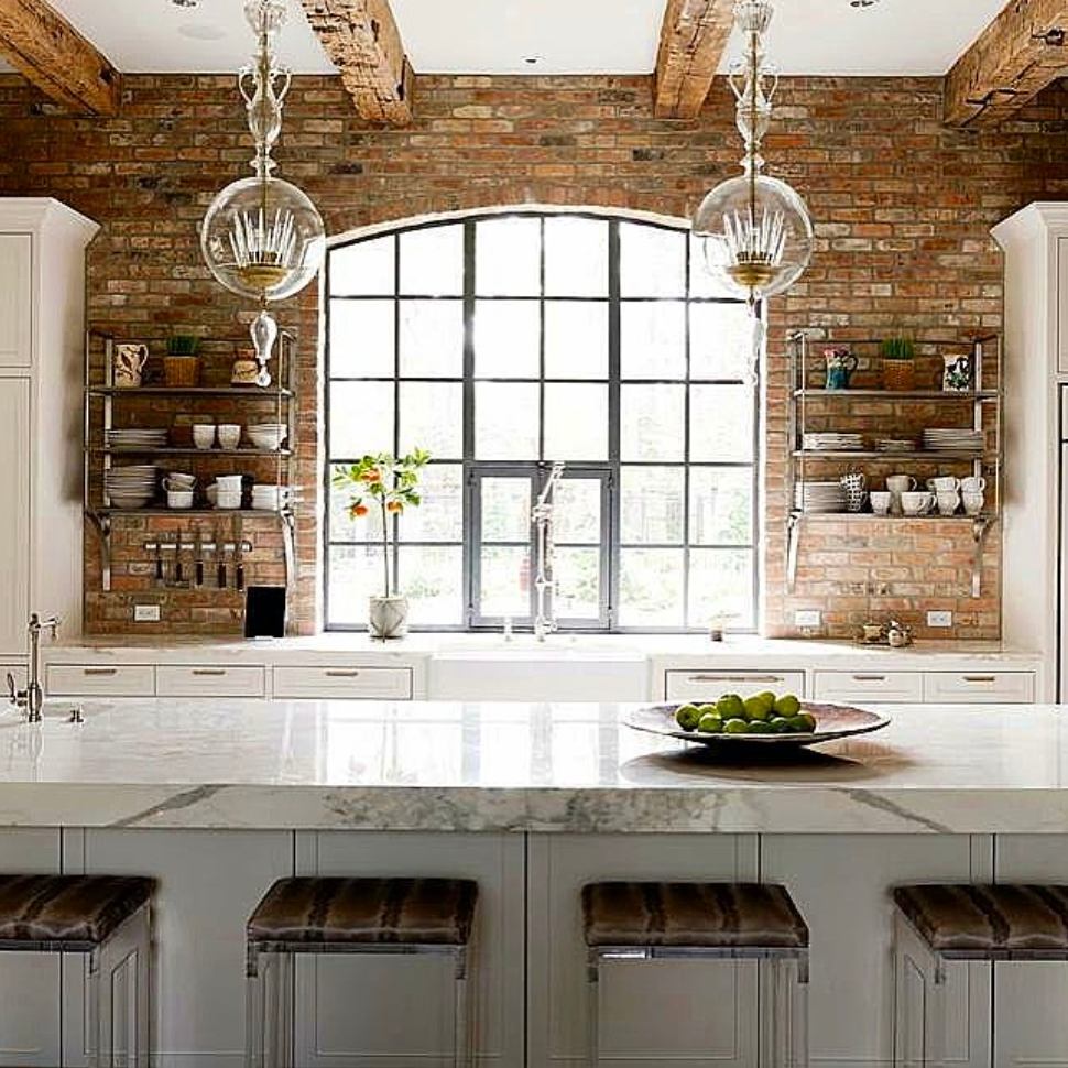 Luxury kitchen with brick wall