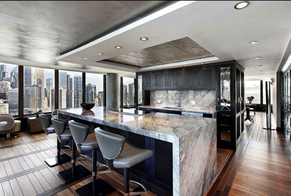Penthouse kitchen with marble island
